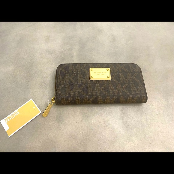 Michael Kors Handbags - Michael Kors zip around wallet, brown, NWT